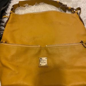 Mustard color Dooney and Bourke bag